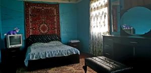Кровать или кровати в номере Luka House