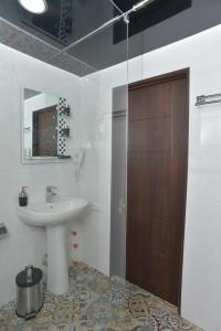 Ванная комната в Central apartments