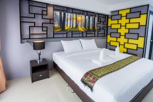 PP@Hotel Rangsit客房内的一张或多张床位