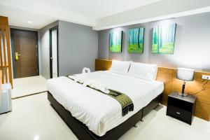 PP@Hotel Rangsit客房内的一张或多张床位