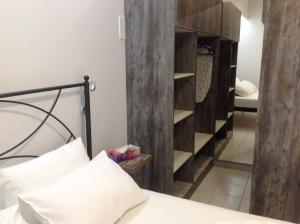 Postel nebo postele na pokoji v ubytování Eva Rooms