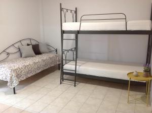Postel nebo postele na pokoji v ubytování Eva Rooms