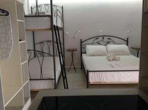 Postel nebo postele na pokoji v ubytování Eva Rooms