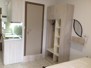 Kuchyň nebo kuchyňský kout v ubytování Eva Rooms