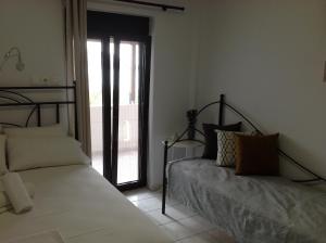 Postel nebo postele na pokoji v ubytování Eva Rooms