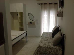 Postel nebo postele na pokoji v ubytování Eva Rooms