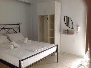 Postel nebo postele na pokoji v ubytování Eva Rooms
