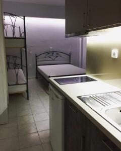 Kuchyň nebo kuchyňský kout v ubytování Eva Rooms