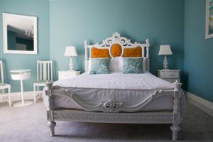 Säng eller sängar i ett rum på Abbey View House