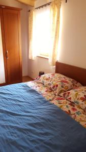 Łóżko lub łóżka w pokoju w obiekcie Römerstraße 10 KG, Appartement Inntal