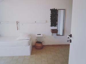 Postel nebo postele na pokoji v ubytování Filio Guesthouse