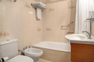 Koupelna v ubytování Hotel Tres Reyes