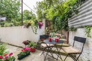 Vonkajšia záhrada v ubytovaní Guest House Beach & City + 23 fotografií