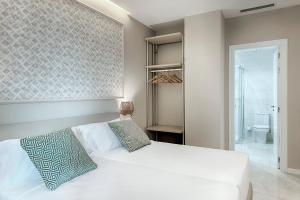 Posteľ alebo postele v izbe v ubytovaní Opera House Valencia B&B