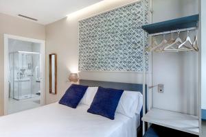 Posteľ alebo postele v izbe v ubytovaní Opera House Valencia B&B