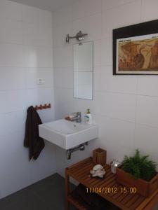 Ett badrum på House Beach Las Palmeiras