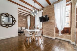 TV a/nebo společenská místnost v ubytování My Loft 4 You Ruzafa Style II