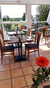 A balcony or terrace at Møn Golf Resort - Hotel Præstekilde