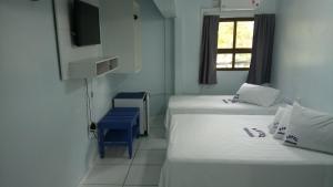 
Cama ou camas em um quarto em Hotel Serrador
