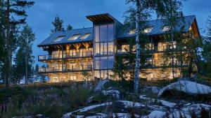an image of a large house at night at Naava Chalet First Floor in Ähtäri