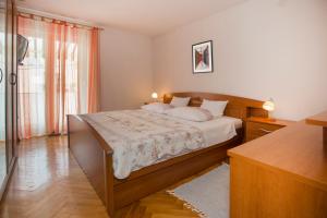 Postel nebo postele na pokoji v ubytování Apartment Marijeta
