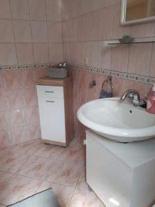 Koupelna v ubytování Apartman Alberta + 34 fotografií