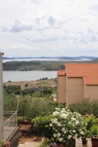 a view of a lake from a house at Studio apartman Ana in Šibenik