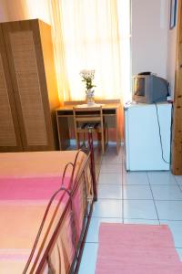 Postel nebo postele na pokoji v ubytování AL BORGO VACANZE B&B