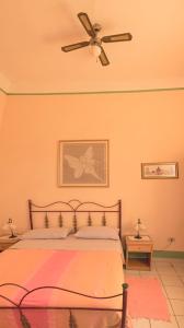 Postel nebo postele na pokoji v ubytování AL BORGO VACANZE B&B