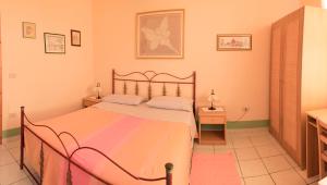 Postel nebo postele na pokoji v ubytování AL BORGO VACANZE B&B