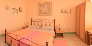 Postel nebo postele na pokoji v ubytování AL BORGO VACANZE B&B
