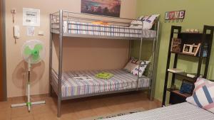 Voodi või voodid majutusasutuse Cozy Loft toas