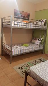 Postel nebo postele na pokoji v ubytování Cozy Loft