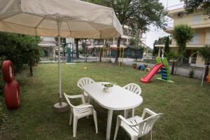 A garden outside Atira Apartment Hotel