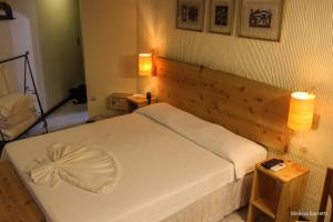 Cama ou camas em um quarto em Hotel da Cachoeira