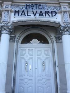 a front door of a building with a sign above it at Halvard Hotel in Douglas