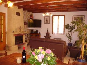 TV a/nebo společenská místnost v ubytování La Plaine de Baillard