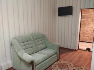 TV a/nebo společenská místnost v ubytování Tumar + 8 fotografií
