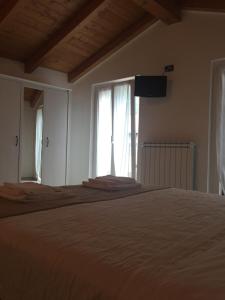 A bed or beds in a room at casa stefania