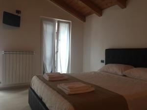 A bed or beds in a room at casa stefania