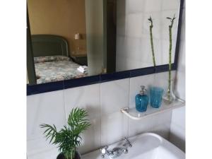 Postel nebo postele na pokoji v ubytování Casa Tinoco Casa Rural Categoria Superior