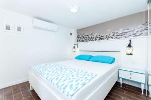 Ένα ή περισσότερα κρεβάτια σε δωμάτιο στο Villa Rokova Vala
