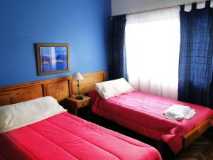 Postel nebo postele na pokoji v ubytování Hotel Mustapic
