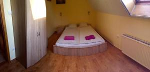 Postel nebo postele na pokoji v ubytování Hotel Amarillis