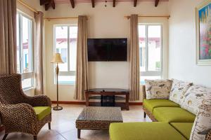 Μια τηλεόραση ή/και κέντρο ψυχαγωγίας στο Four Diamonds Park Villas