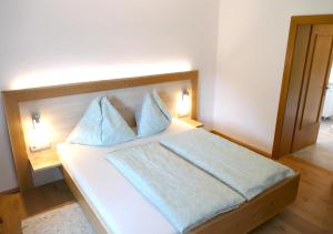 Кровать или кровати в номере Haus Appesbacher