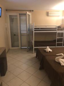 Postel nebo postele na pokoji v ubytování Hotel Clair de Lune
