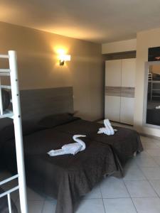 Postel nebo postele na pokoji v ubytování Hotel Clair de Lune