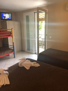 Postel nebo postele na pokoji v ubytování Hotel Clair de Lune
