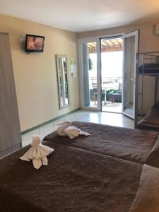 Postel nebo postele na pokoji v ubytování Hotel Clair de Lune